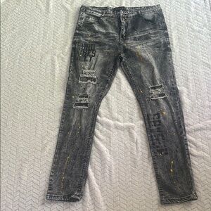 Encrypted Distressed Gray and Black Jeans with Yellow Accents